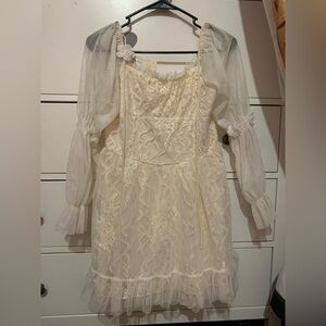 A white floral light creamy white dress with a flower tie 💕